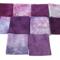 Hand dyed quilting cotton in shades of purple and pink